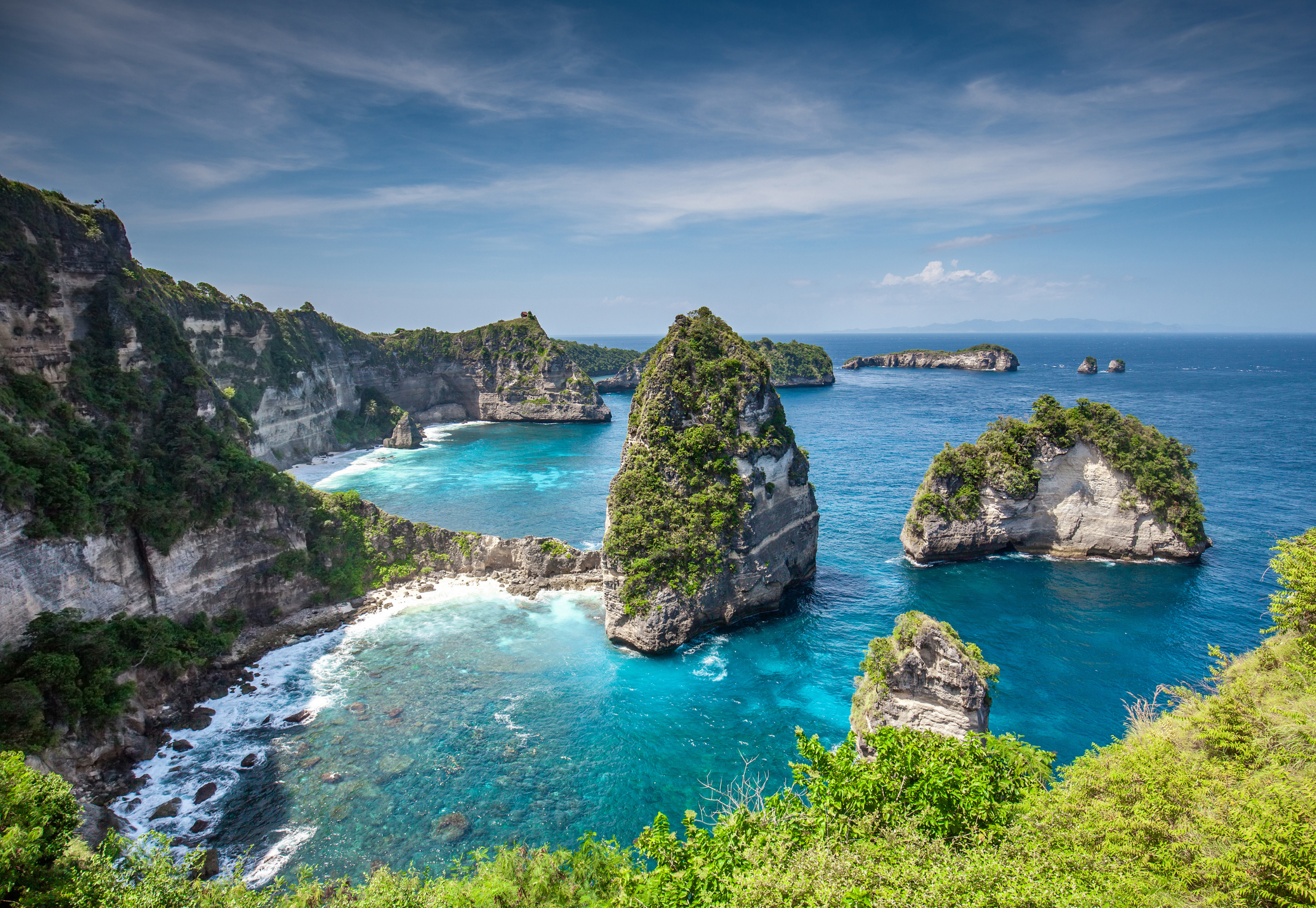 Bali Tour [Kintamani + Nusa Penida Island + Water Sport Activity + Uluwatu or Tanah Lot]